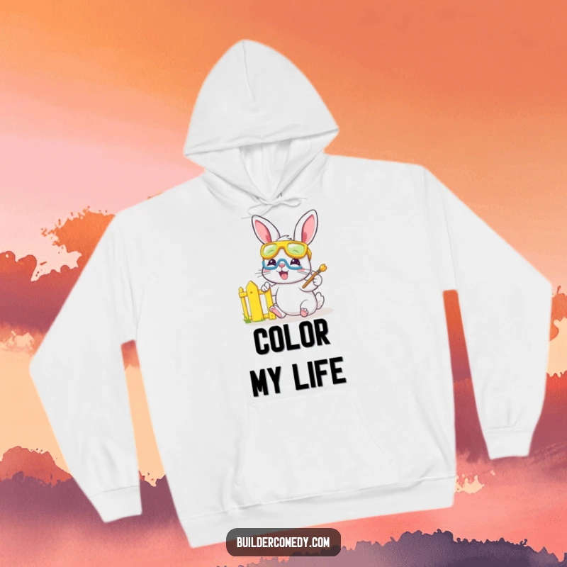 Funny bunny wearing safety goggles and painting a fence, cozy hoodie for artists.