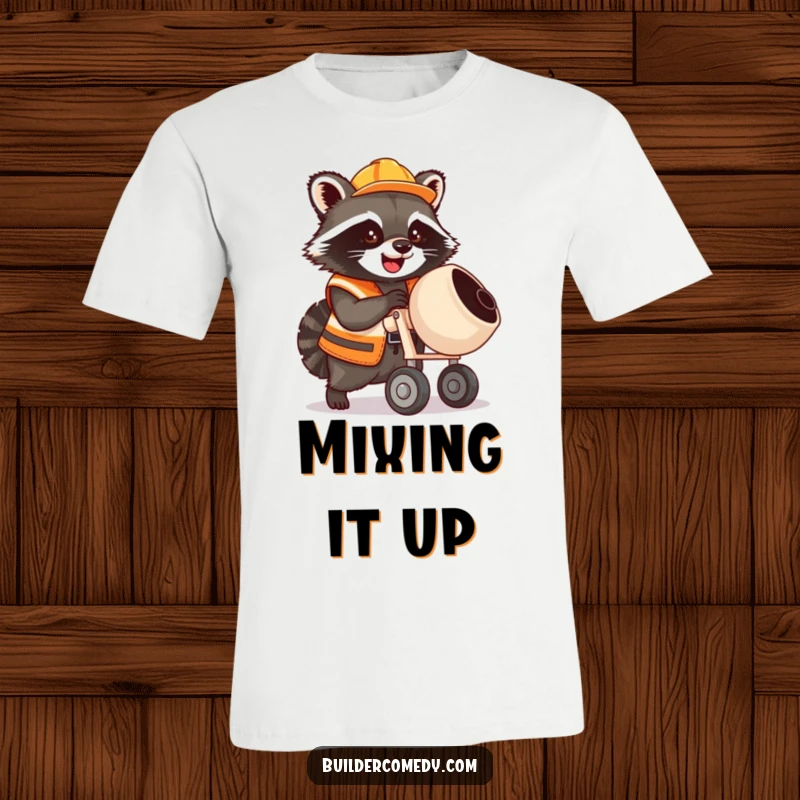 Cute raccoon in a construction vest operating a miniature cement mixer, funny t-shirt design.